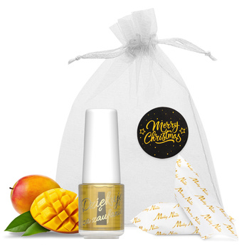 Sonderedition Nagelhaut- und Nagelöl mit Mango-Duft und Karamellbonbons in einem dekorativen Säckchen, 5 ml