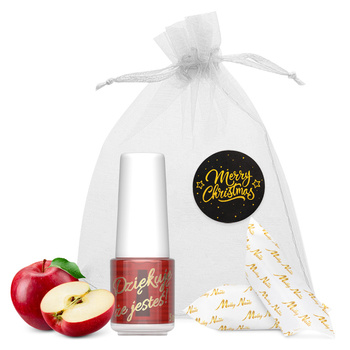 Aceite especial para cutículas y uñas con aroma a manzana roja y toffees, en una bolsita decorativa de 5 ml